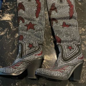 Black, red , and white knee high cowboy boots